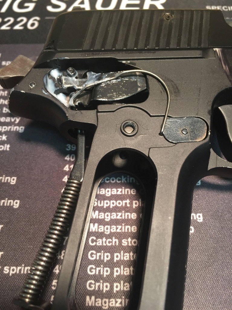 Original "bent" trigger bar spring in a W German P226