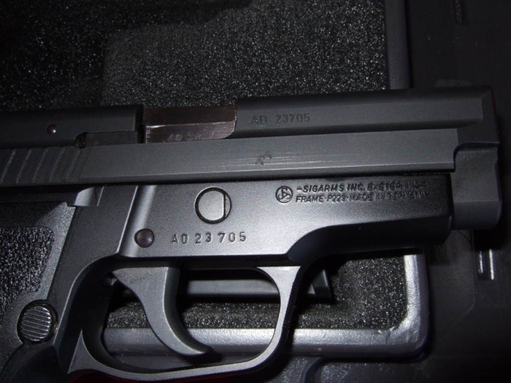 US-assembled SIG P229 with US slide, US barrel, and German frame. 