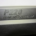 SIG P220 with the Sauer logo "peened" over the "W." in "W. Germany"