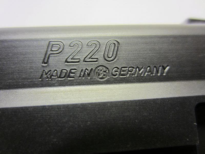 SIG P220 with the Sauer logo "peened" over the "W." in "W. Germany"