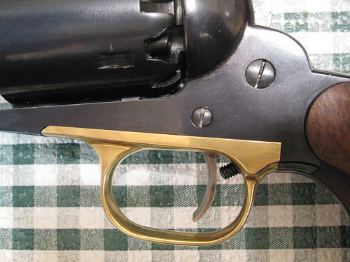 Frame-mounted adjustable trigger stop